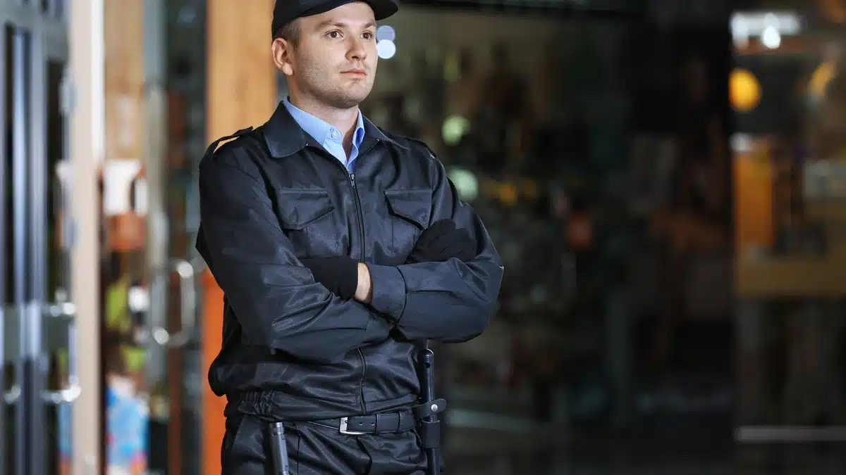 How to Choose the Right Concierge Security Team for Your Office Building How to Choose the Right Concierge Security Team for Your Office Building – A uniformed security guard stands with arms crossed, providing a professional and attentive presence.