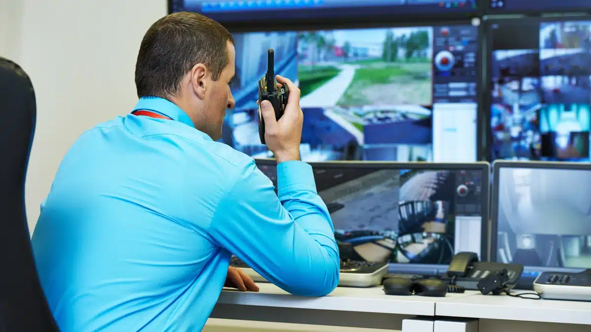 Insurance Carriers Are Raising the Bar on Property Security Insurance Carriers Are Raising the Bar on Property Security – Security personnel review multiple surveillance camera feeds on a monitoring display.