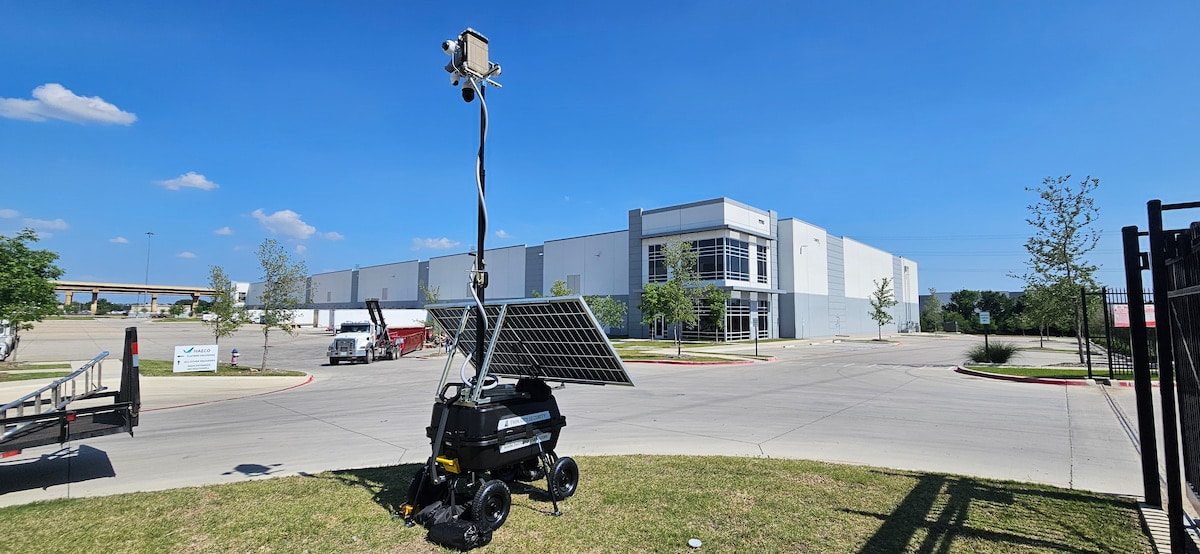 tcs-trailer-cameras-1 Mobile solar surveillance unit outside warehouse building
